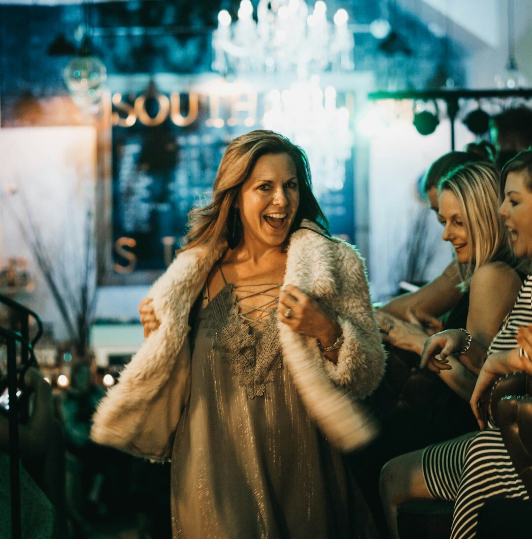 Elegant woman posing in stylish outfit at an evening event