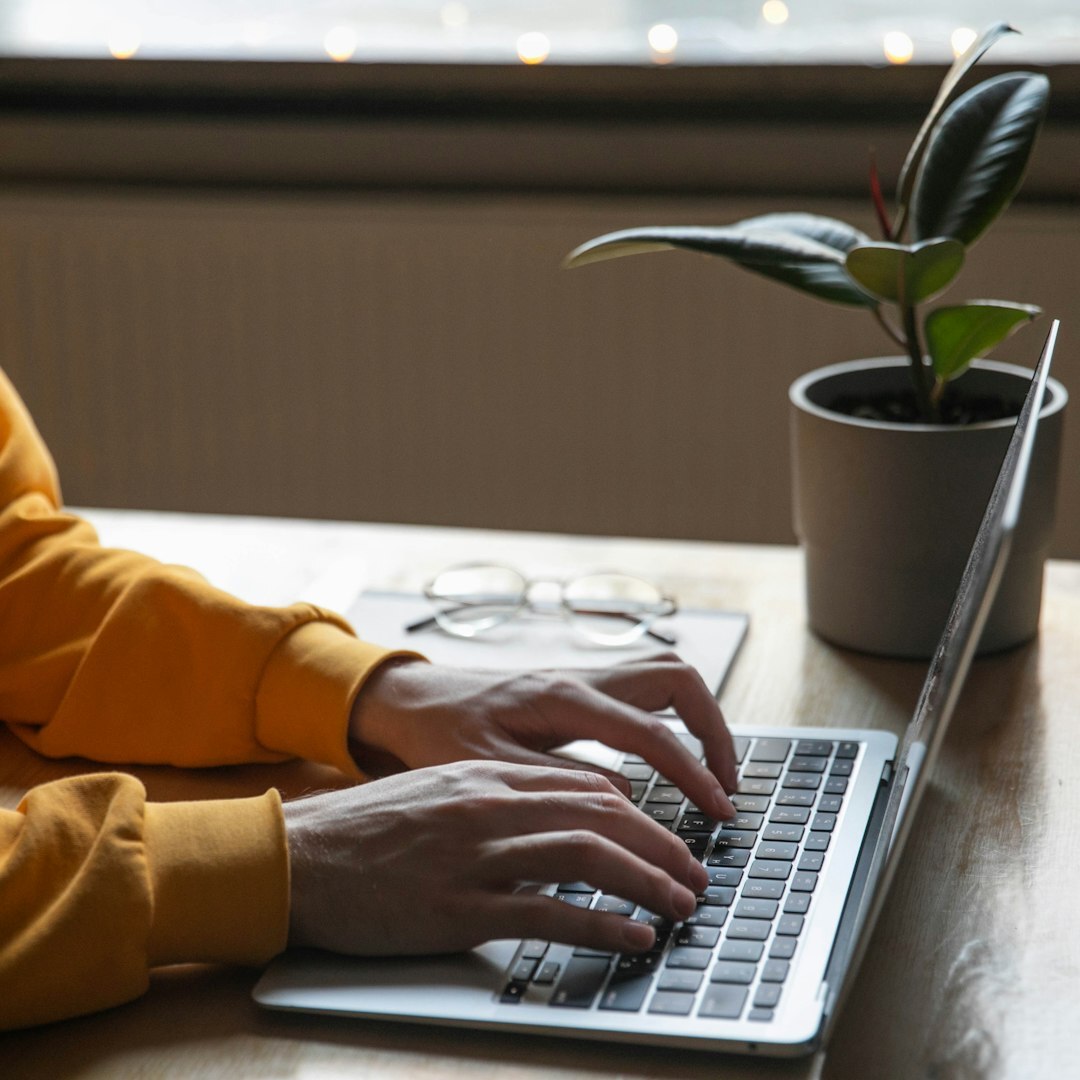 Journalist writing notes at a desk