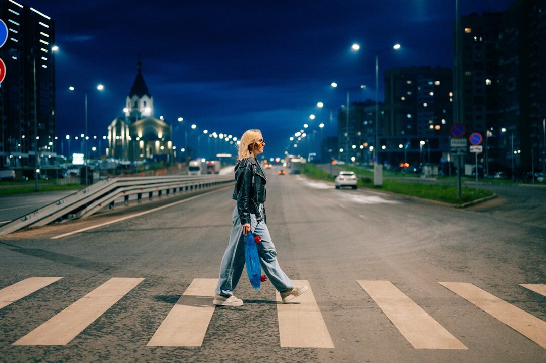 singer walking city street